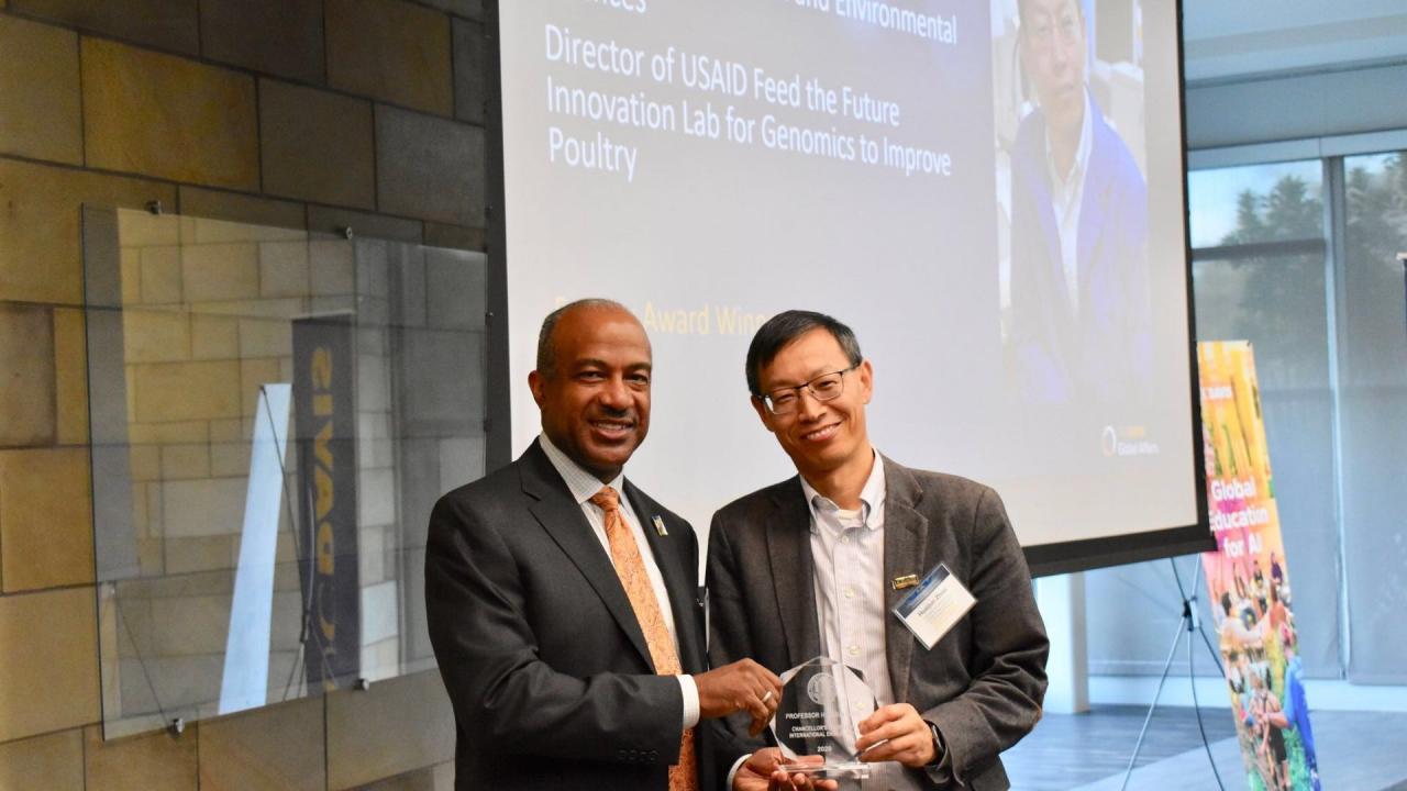 Chancellor Gary S. May and Dr. Huaijun Zhou: 2020 Chancellor’s Awards for International Engagement Chancellor’s Award for International Engagement